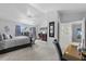 Spacious main bedroom boasts vaulted ceilings, large windows and serene decor elements at 6810 Crystal Beach Rd, Winter Haven, FL 33880