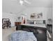 Large main bedroom showcases a bed with a dark frame, vaulted ceilings, and serene decor at 6810 Crystal Beach Rd, Winter Haven, FL 33880