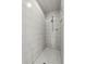 Shower with white tiling and glass door at 6810 Crystal Beach Rd, Winter Haven, FL 33880