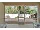 Screened patio with views of the brick-paved yard, offering a bug-free outdoor living space at 6907 Eagle Ridge Blvd, Lakeland, FL 33813