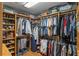 Custom closet design featuring ample storage and organization solutions for clothes, shoes, and accessories at 7010 Parliament Pl, Lakeland, FL 33809