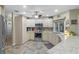Well-equipped kitchen with stainless steel appliances, ample cabinet space, and granite countertops at 7010 Parliament Pl, Lakeland, FL 33809