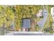Aerial view of the roof of the home and driveway including three cars at 723 W Patterson St, Lakeland, FL 33803