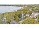 Beautiful aerial view showcasing the home's proximity to the tranquil lake and verdant surroundings at 723 W Patterson St, Lakeland, FL 33803