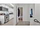 Hallway leading to the kitchen and bathroom at 723 W Patterson St, Lakeland, FL 33803