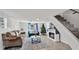 Cozy living room featuring a fireplace, plush seating, and natural light at 723 W Patterson St, Lakeland, FL 33803