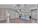 Open-concept living area with luxury vinyl plank flooring and bright recessed lighting at 8158 Woodvine Cir, Lakeland, FL 33810