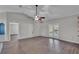 Open-concept living area with lots of natural light and access to the pool area at 8158 Woodvine Cir, Lakeland, FL 33810