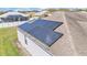 Close-up of solar panels on the roof of the home, highlighting its energy-efficient features at 8158 Woodvine Cir, Lakeland, FL 33810