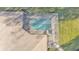 Aerial view of the screened-in pool and spa at 9216 Tom Moore Rd, Lakeland, FL 33810