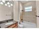 Well-maintained bathroom with a single sink vanity and a combined shower-bathtub at 9216 Tom Moore Rd, Lakeland, FL 33810