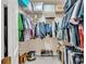 Spacious walk-in closet with ample storage space and wire shelving for organized clothing and accessories at 9216 Tom Moore Rd, Lakeland, FL 33810