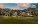Beautiful single-Gathering home with meticulous landscaping and a welcoming front entrance at 9216 Tom Moore Rd, Lakeland, FL 33810