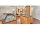 Spacious kitchen with stainless appliances, granite countertops and wood cabinets and eat in bar at 9216 Tom Moore Rd, Lakeland, FL 33810
