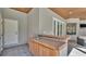 Outdoor kitchen area features a sink and ample counter space for entertaining by the pool at 9216 Tom Moore Rd, Lakeland, FL 33810