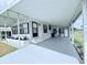 Spacious covered carport leading to the front entrance of the single-story home at 1007 Elizabeth Ln, Lakeland, FL 33809