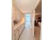 Hallway features built-in cabinets for extra storage and leads into the bedroom at 1007 Elizabeth Ln, Lakeland, FL 33809