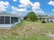 Spacious backyard area offering privacy and a view of the surrounding neighborhood at 1064 Penguin Pl, Lakeland, FL 33809