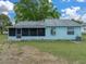 This home has a screened lanai and fenced backyard at 1064 Penguin Pl, Lakeland, FL 33809