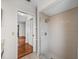 Shower stall featuring tiled walls and floor with glass door and chrome fixture at 1064 Penguin Pl, Lakeland, FL 33809