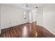 Bedroom with hardwood floors, neutral walls, and a ceiling fan at 1064 Penguin Pl, Lakeland, FL 33809