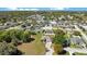 Scenic aerial view of the residential area, highlighting the well-maintained homes and verdant landscape at 107 Amber Blvd, Auburndale, FL 33823