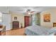 Bright bedroom with wood floors, balcony access, and ample closet space at 1130 N Lake Parker Ave # C328, Lakeland, FL 33805