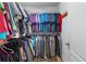 Organized walk-in closet with rows of hanging clothes and ample storage space at 117 Belmont Dr, Winter Haven, FL 33884