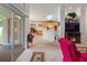 Inviting living room offering a view into the kitchen and a screened porch at 117 Belmont Dr, Winter Haven, FL 33884