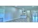 Open floor plan shows living room and kitchen at 1588 Leamington Ln, Winter Haven, FL 33884