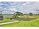 Community playground provides a safe and fun recreational area for , encouraging active play and social interaction at 1588 Leamington Ln, Winter Haven, FL 33884