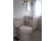 Bathroom with a toilet and sink, offering essential functionality at 1610 Reynolds Rd # 239, Lakeland, FL 33801