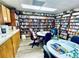 Cozy library with bookshelves filled with books, offering a quiet reading space at 1610 Reynolds Rd # 239, Lakeland, FL 33801