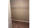 Walk-in closet with carpeted floor and wire shelving at 1921 Bell Creek Loop, Fruitland Park, FL 34731