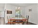 Inviting dining room featuring a tile table, and natural light from a large window at 2030 Country Manor St, Bartow, FL 33830