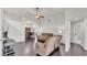 Spacious living room featuring high ceilings, dark hardwood floors and a view to the foyer at 2030 Country Manor St, Bartow, FL 33830