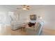 Inviting living room featuring tile flooring, a staircase, and recessed lighting at 2210 Moraine Ct, Lakeland, FL 33805