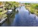 Scenic view of the winding waterway, showcasing the peaceful waterfront living at 27836 Lois Dr, Tavares, FL 32778