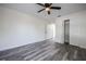 Bedroom features wood-look flooring and ample closet space for great storage options at 3166 Valley Vista Cir, Lakeland, FL 33812