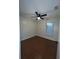 Bedroom features hardwood flooring, ceiling fan and a window at 3626 Amber Ln, Lakeland, FL 33812