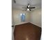 Bedroom with hardwood flooring and a ceiling fan at 3626 Amber Ln, Lakeland, FL 33812