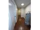 Hallway with tile floors, neutral paint colors, and recessed lighting at 3626 Amber Ln, Lakeland, FL 33812