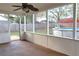 Screened porch overlooking the backyard with above-ground pool at 3626 Amber Ln, Lakeland, FL 33812