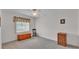 A bedroom featuring a window and neutral carpet at 3717 Highland Fairways Blvd, Lakeland, FL 33810