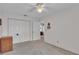 Bedroom with double doors and a ceiling fan at 3717 Highland Fairways Blvd, Lakeland, FL 33810