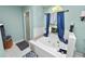 Bathroom featuring a tiled tub beneath a window and glass enclosed shower at 5051 Ironwood Trl, Bartow, FL 33830