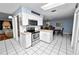 Functional kitchen with white cabinetry and stainless steel appliances at 5051 Ironwood Trl, Bartow, FL 33830