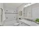 Clean bathroom with a shower-tub combination and marble sink at 615 Carey Pl, Lakeland, FL 33803