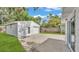 Detached two-car garage with a driveway at 615 Carey Pl, Lakeland, FL 33803