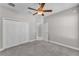 Large bedroom with a ceiling fan and a closet at 6185 Gracie Pl, Lakeland, FL 33812